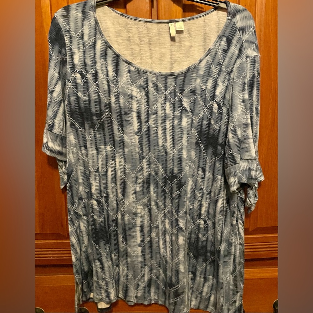 Ladies size large blue quarter sleeve top with bows on the sleeves.  .